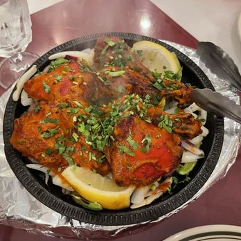 Delhi palace signature dishes Chicken CurryVegetable KormaTandoori Roti